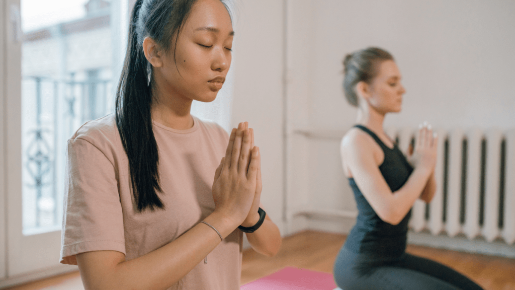 Women Meditating together 